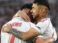 Adam Barreiro and Paulo Diaz of River Plate celebrate their team's goal during the match between River Plate and Barracas Central at Estadio...