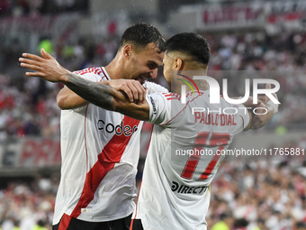 Leandro Gonzalez Pirez and Paulo Diaz of River Plate celebrate their team's goal during the match between River Plate and Barracas Central a...