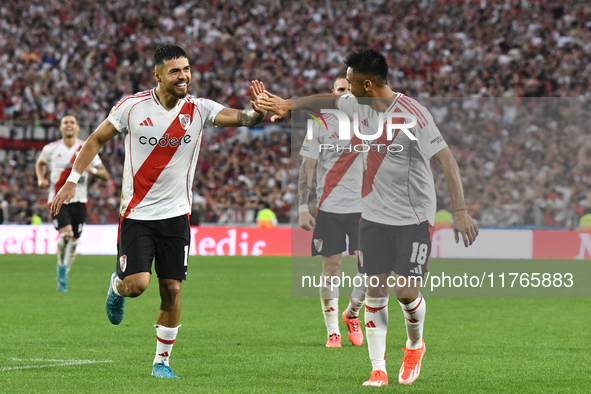 Paulo Diaz and Gonzalo Martinez of River Plate celebrate their team's goal during the match between River Plate and Barracas Central at Esta...