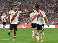 Paulo Diaz and Gonzalo Martinez of River Plate celebrate their team's goal during the match between River Plate and Barracas Central at Esta...