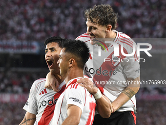 Maximiliano Meza, Facundo Colidio, and Gonzalo Martinez of River Plate celebrate their team's goal during the match between River Plate and...