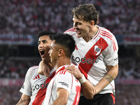 Maximiliano Meza, Facundo Colidio, and Gonzalo Martinez of River Plate celebrate their team's goal during the match between River Plate and...