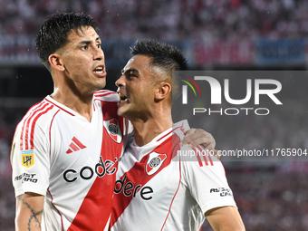 Maximiliano Meza and Gonzalo Martinez of River Plate celebrate their team's goal during the match between River Plate and Barracas Central a...