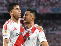 Maximiliano Meza and Gonzalo Martinez of River Plate celebrate their team's goal during the match between River Plate and Barracas Central a...