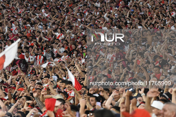 Fans of River Plate attend the match between River Plate and Barracas Central at Estadio Mas Monumental, on November 9. 