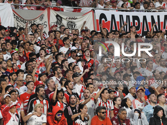 Fans of River Plate attend the match between River Plate and Barracas Central at Estadio Mas Monumental, on November 9. (