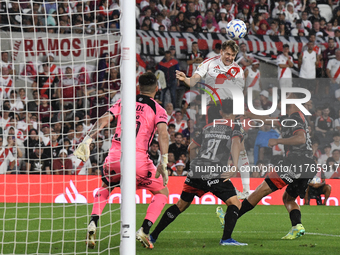 Facundo Colidio of River Plate heads the ball in the opponent's area during the match between River Plate and Barracas Central at Estadio Ma...