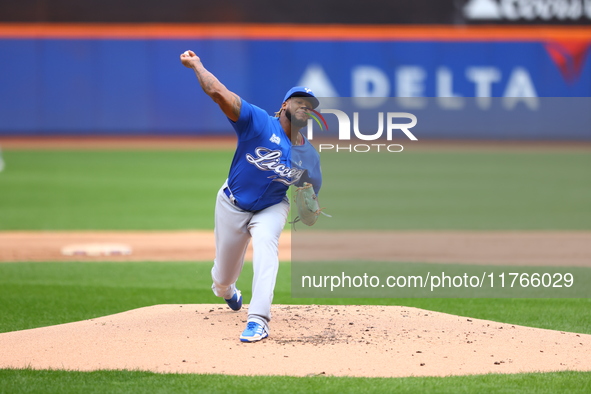 Los Tigres del Licey starting pitcher Lisalverto Bonilla #66 throws during the first inning of a baseball game against Las Aguilas Cibaenas...