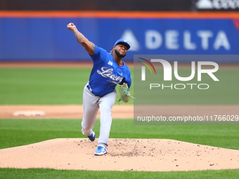 Los Tigres del Licey starting pitcher Lisalverto Bonilla #66 throws during the first inning of a baseball game against Las Aguilas Cibaenas...