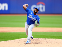 Los Tigres del Licey starting pitcher Lisalverto Bonilla #66 throws during the first inning of a baseball game against Las Aguilas Cibaenas...