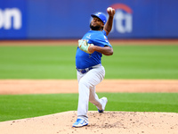 Los Tigres del Licey starting pitcher Lisalverto Bonilla #66 throws during the first inning of a baseball game against Las Aguilas Cibaenas...