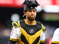 Las Aguilas Cibaenas catcher J.C Escarra #59 comes off the field during the second inning of a baseball game against Los Tigres del Licey at...