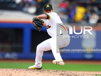 Las Aguilas Cibaenas pitcher Carlos Espinal #70 throws during the sixth inning of a baseball game against Los Tigres del Licey at Citi Field...