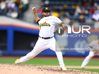 Las Aguilas Cibaenas pitcher Carlos Espinal #70 throws during the sixth inning of a baseball game against Los Tigres del Licey at Citi Field...