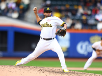 Las Aguilas Cibaenas pitcher Carlos Espinal #70 throws during the sixth inning of a baseball game against Los Tigres del Licey at Citi Field...