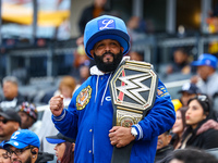 The Los Tigres del Licey fans cheer during the baseball game against Las Aguilas Cibaenas at Citi Field in Corona, N.Y., on November 10, 202...