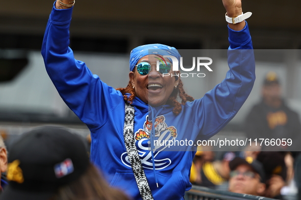 The Los Tigres del Licey fans cheer during the baseball game against Las Aguilas Cibaenas at Citi Field in Corona, N.Y., on November 10, 202...