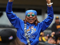 The Los Tigres del Licey fans cheer during the baseball game against Las Aguilas Cibaenas at Citi Field in Corona, N.Y., on November 10, 202...