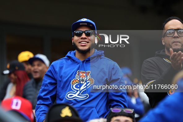 The Los Tigres del Licey fans cheer during the baseball game against Las Aguilas Cibaenas at Citi Field in Corona, N.Y., on November 10, 202...