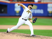 Las Aguilas Cibaenas pitcher Junior Fernandez #73 throws during the ninth inning of a baseball game against Los Tigres del Licey at Citi Fie...