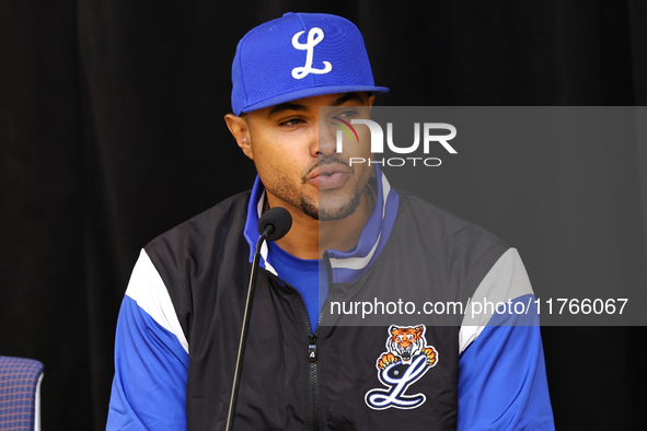 Los Tigres del Licey manager Gilbert Gomez speaks to the media after the baseball game against Las Aguilas Cibaenas at Citi Field in Corona,...