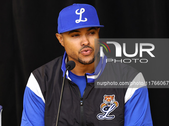 Los Tigres del Licey manager Gilbert Gomez speaks to the media after the baseball game against Las Aguilas Cibaenas at Citi Field in Corona,...