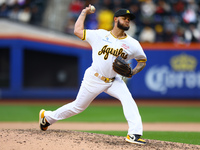 Las Aguilas Cibaenas pitcher Jonathan Hernandez #72 throws during the seventh inning of a baseball game against Los Tigres del Licey at Citi...