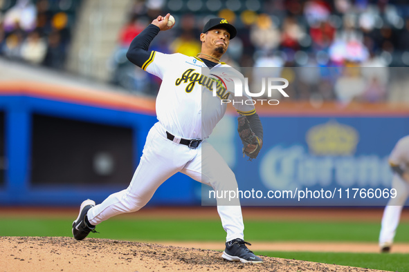 Las Aguilas Cibaenas pitcher Keone Kela #26 throws during the sixth inning of a baseball game against Los Tigres del Licey at Citi Field in...