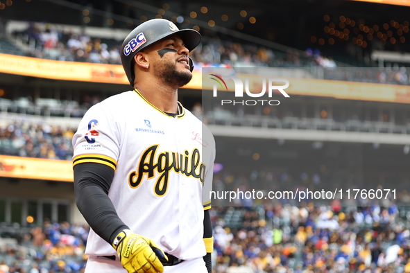 Juan Lagares #17 of Las Aguilas Cibaenas comes off the field during the second inning of a baseball game against Los Tigres del Licey at Cit...