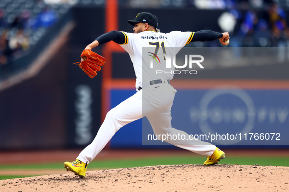 Las Aguilas Cibaenas pitcher Dinelson Lamet #71 throws during the third inning of a baseball game against Los Tigres del Licey at Citi Field...