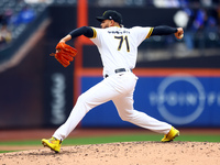 Las Aguilas Cibaenas pitcher Dinelson Lamet #71 throws during the third inning of a baseball game against Los Tigres del Licey at Citi Field...