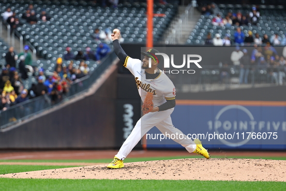 Las Aguilas Cibaenas pitcher Dinelson Lamet #71 throws during the third inning of a baseball game against Los Tigres del Licey at Citi Field...