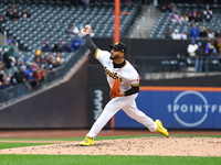 Las Aguilas Cibaenas pitcher Dinelson Lamet #71 throws during the third inning of a baseball game against Los Tigres del Licey at Citi Field...