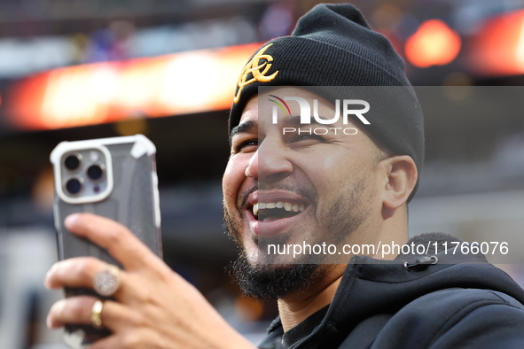 The Las Aguilas Cibaenas fans cheer during the baseball game against the Los Tigres del Licey at Citi Field in Corona, N.Y., on November 10,...