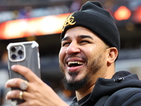 The Las Aguilas Cibaenas fans cheer during the baseball game against the Los Tigres del Licey at Citi Field in Corona, N.Y., on November 10,...