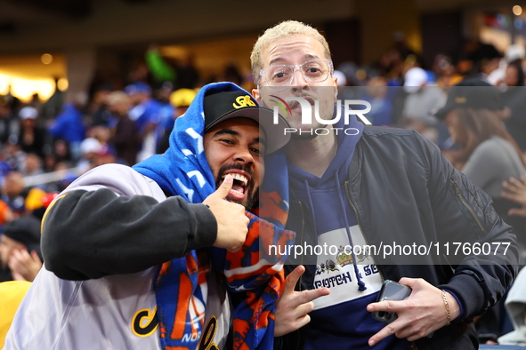 The Las Aguilas Cibaenas fans cheer during the baseball game against the Los Tigres del Licey at Citi Field in Corona, N.Y., on November 10,...