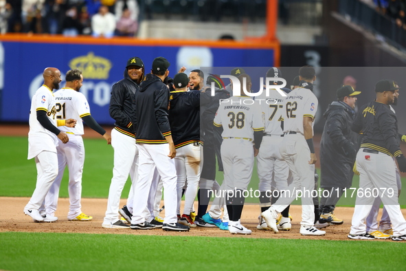 Las Aguilas Cibaenas celebrate their 3-2 walk-off win in a baseball game against Los Tigres del Licey at Citi Field in Corona, N.Y., on Nove...