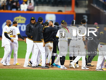 Las Aguilas Cibaenas celebrate their 3-2 walk-off win in a baseball game against Los Tigres del Licey at Citi Field in Corona, N.Y., on Nove...