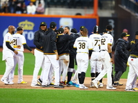 Las Aguilas Cibaenas celebrate their 3-2 walk-off win in a baseball game against Los Tigres del Licey at Citi Field in Corona, N.Y., on Nove...