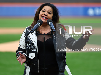 Latin performer Miosotis sings the anthem of the United States before the baseball game between Los Tigres del Licey and Las Aguilas Cibaena...