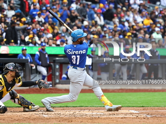 Liover Peguero #31 of Los Tigres del Licey bats during the third inning of a baseball game against Las Aguilas Cibaenas at Citi Field in Cor...