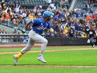 Liover Peguero #31 of Los Tigres del Licey bats during the third inning of a baseball game against Las Aguilas Cibaenas at Citi Field in Cor...