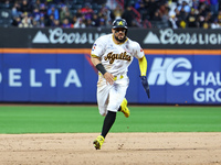 Yefri Perez #66 of Las Aguilas Cibaenas advances to third base during the ninth inning of a baseball game against Los Tigres del Licey at Ci...