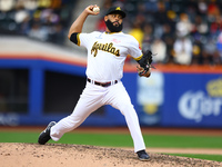 Las Aguilas Cibaenas pitcher Richard Rodriguez #19 throws during the eighth inning of a baseball game against Los Tigres del Licey at Citi F...