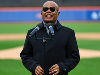 Merengue performer Rubby Perez sings the anthem of the Dominican Republic before the baseball game between Los Tigres del Licey and Las Agui...