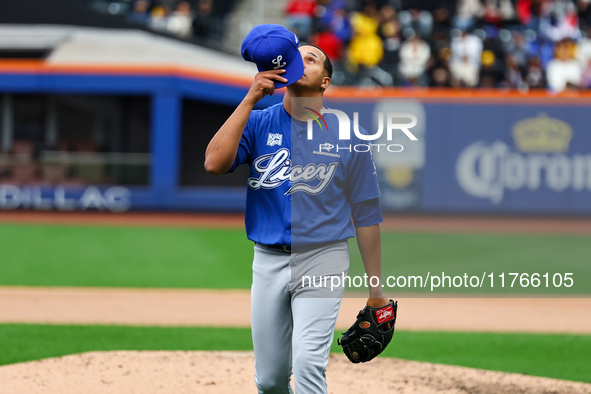 Los Tigres del Licey pitcher Juan Then #49 comes off the field during the fifth inning of a baseball game against Las Aguilas Cibaenas at Ci...