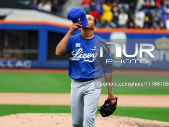 Los Tigres del Licey pitcher Juan Then #49 comes off the field during the fifth inning of a baseball game against Las Aguilas Cibaenas at Ci...