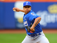 Los Tigres del Licey pitcher Juan Then #49 throws during the fifth inning of a baseball game against Las Aguilas Cibaenas at Citi Field in C...