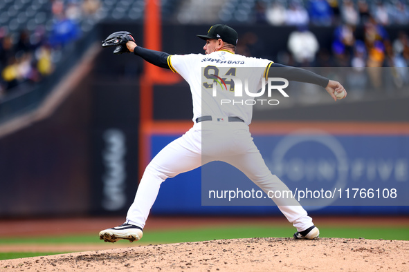 Las Aguilas Cibaenas pitcher Nick Wittgren #94 throws during the third inning of a baseball game against Los Tigres del Licey at Citi Field...