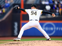 Las Aguilas Cibaenas pitcher Nick Wittgren #94 throws during the third inning of a baseball game against Los Tigres del Licey at Citi Field...